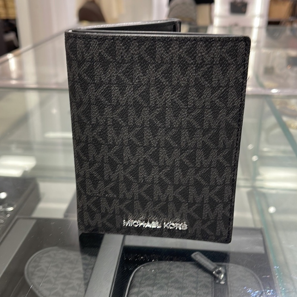 Michael Kors Jet Set Travel Passport Wallet
Black Signature/Silver-Tone Hardware - Picture 11 of 16